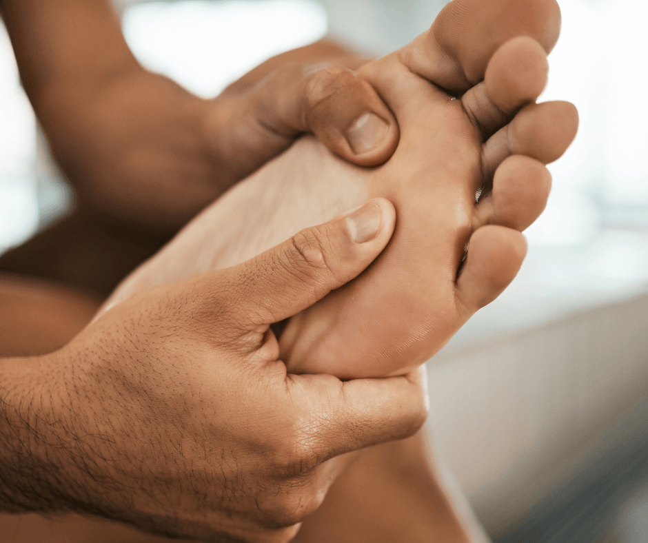 checking foot for splinter